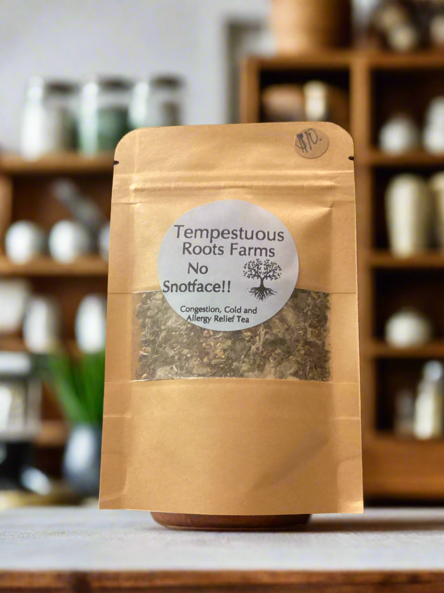 No Snotface herbal allergy relief tea with blurred background