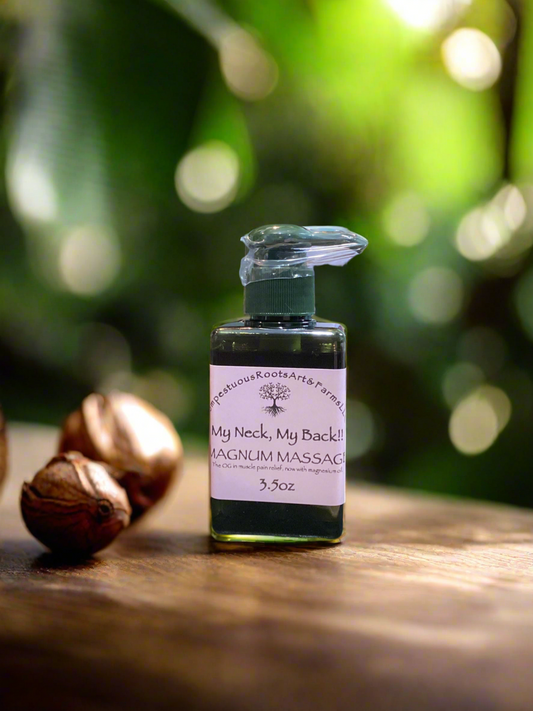 Bottle of 'My Neck, My Back!' Magnum Massage, the pain relieving massage oil on a wooden surface with blurred green background.