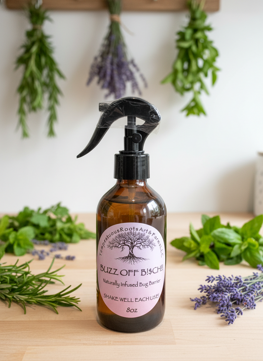 Brown spray bottle with a label on a wooden surface with greenery and lavender in the background
