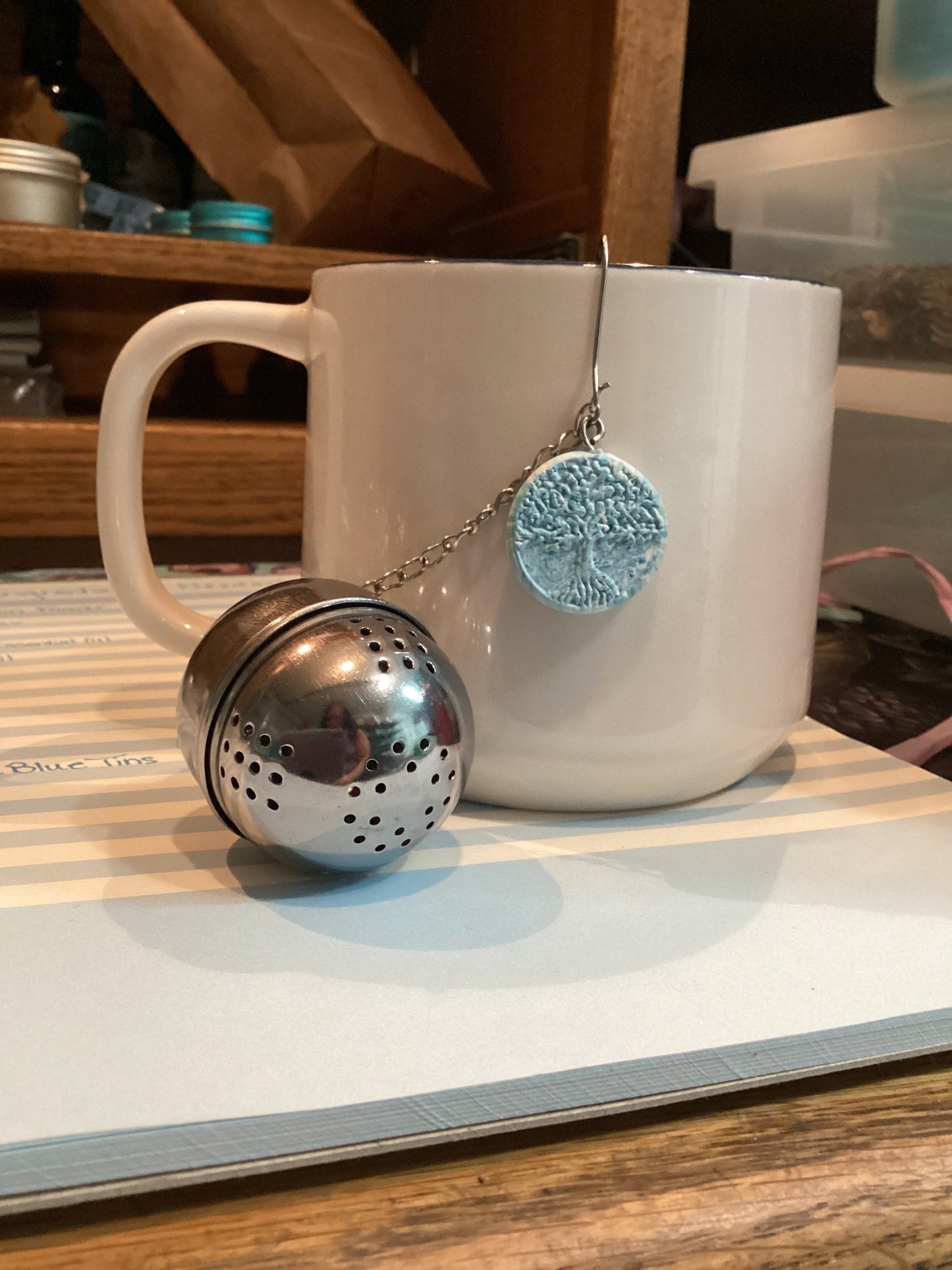 Logo Medallion Stainless Teal Filter Ball - Tempestuous Roots Art & Farms LLC