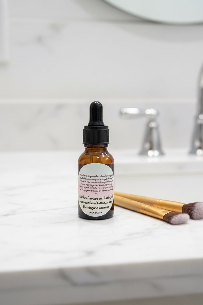 Rooted Mask botanical tattoo and cosmetic aftercare oil with cosmetic brushes on a bathroom counter